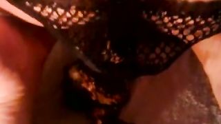 Poop in black fishnets