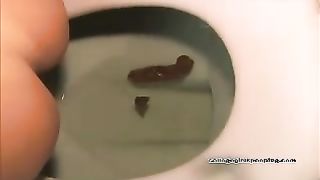 Kissing with her friend while pooping