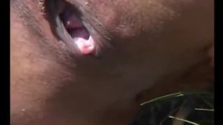 Young girl shitting in a camping zone