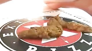 Teen pooping on a pizza box