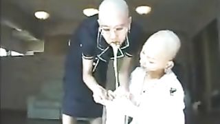 Bald Asians puking on each other