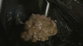 Teen brunette smearing crap on her entire body