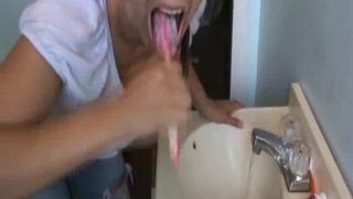 Brunette Girl Puking In the Sink