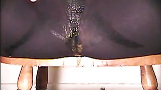 Shit and piss in black pantyhose