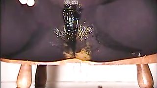 Shit and piss in black pantyhose