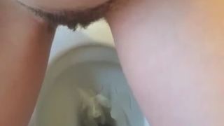 Girl with hairy pussy pooping