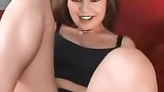 Brunette hottie shitting on a red couch