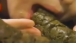 Sucking a brown turd