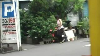 Shitting behind a building in public