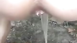 Teen girl shitting in the middle of the road