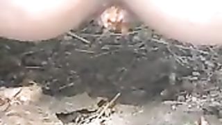 Teen girl shitting in the middle of the road