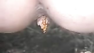 Teen girl shitting in the middle of the road