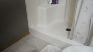 BBW babe pooping over the toilet