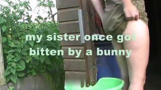 Mature blonde wife pooping in a green bucket
