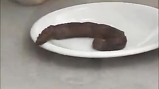 Blonde teen shitting on a plate