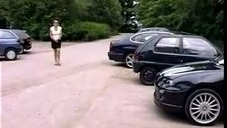 Sexy teen peeing behind a car