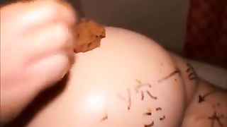 Rubbing shit on his sleepy girlfriend