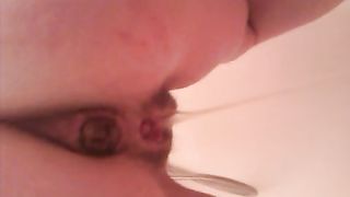 Close up of a girl pooping