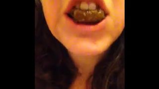 Young girl chewing poop