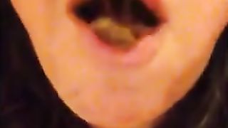 Young girl chewing poop