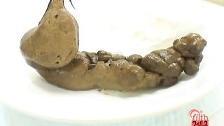Beautiful Asian is really proud of her poop