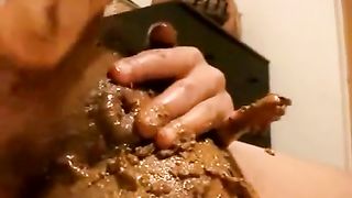 Hot brunette babe smearing shit