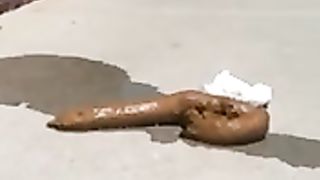 Naughty jogger pooping on the sidewalk