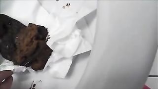 Hot babe in lace black dress pooping