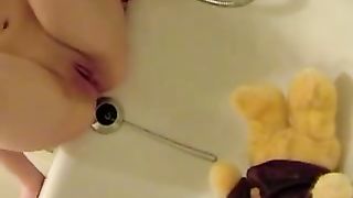 Drunk girl peeing on her teddybear