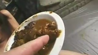 Petite babe eating a lot of poop from a plate