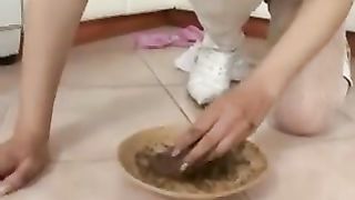 Blonde babe playing with her poop