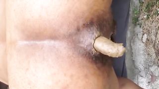Hairy Indian shitting outdoor