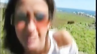 Brunette MILF pooping outdoor in nature