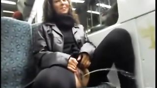 Brown haired MILF peeing in public