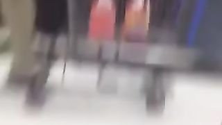 Sexy teen peeing through her blue jeans in public