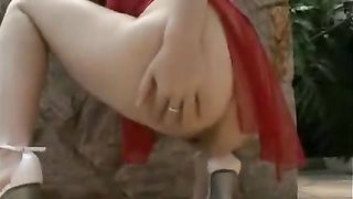 Beautiful blonde model shitting outdoor