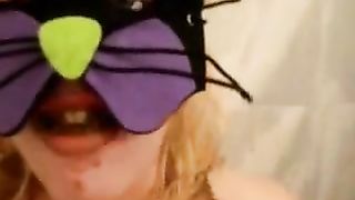 Masked blonde eating and smearing poop