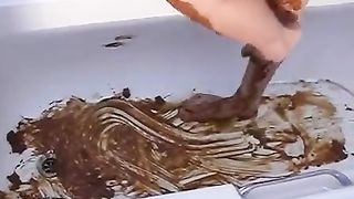 Beautiful brunette with a great ass peeing in close up