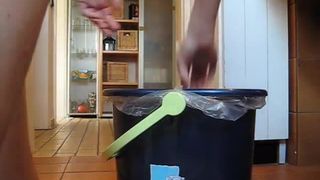 Naked girl pooping in the trash can