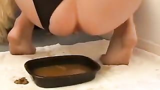 Beautiful blonde doing self enema