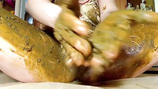 Beautiful babe rubbing shit on her half naked body