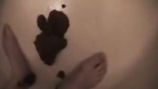 Hot Japanese shitting on her legs