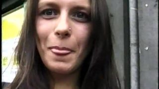 Beautiful brunette dildoing her ass in public