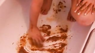 Smoking hot blonde playing with poop