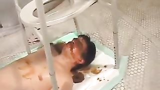 Male slave eating poop from two mistresses