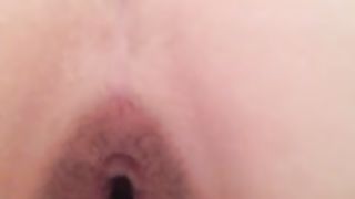 Hairy babe peeing in reverse position