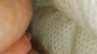 Hot babe with white diapers peeing