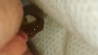 Hot babe with white diapers peeing