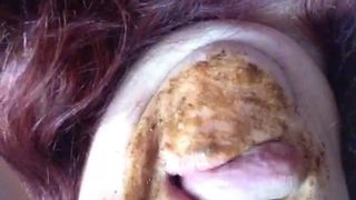 Redhead teen licking shit with her red lips
