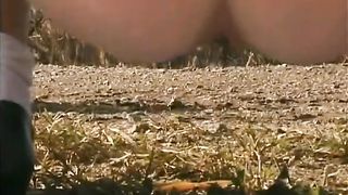 Two students shitting together outdoor